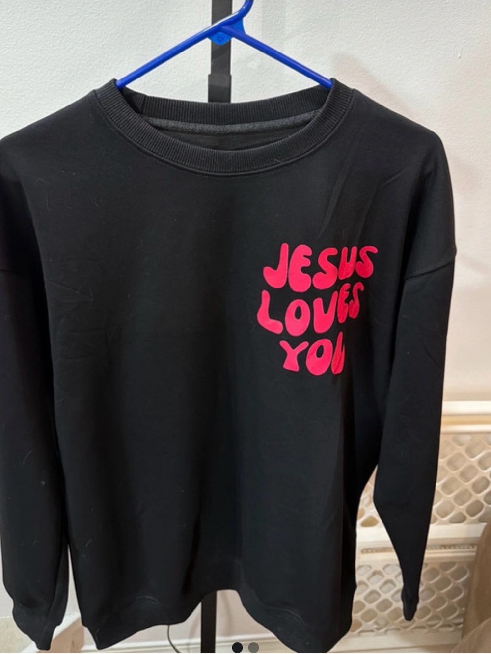 Black Crewneck Sweater with Pink "Jesus Loves You" Graphic